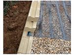 Constructing reinforced retaining wall