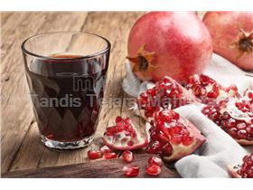 Pomegranate juice concentrate, packed in 265 kg metal drums