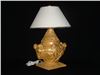 Cow with golden glazed earthenware lamp design