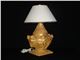 Cow with golden glazed earthenware lamp design