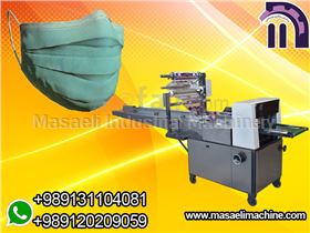 Surgical mask packing machine