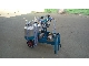 Belt type portable milking machine