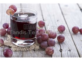 Red grape juice concentrate, packed in 265 kg metal drums
